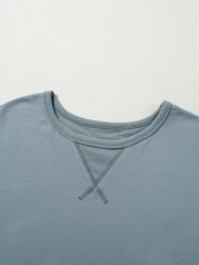 French blue cotton t-shirt dress with crew neck and contrast stitching detail.