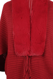 Deep Red knit cape with faux fur collar and fringe detail
