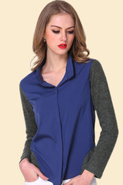 Colorblock knit sleeve blouse in dark blue with a collared neckline.