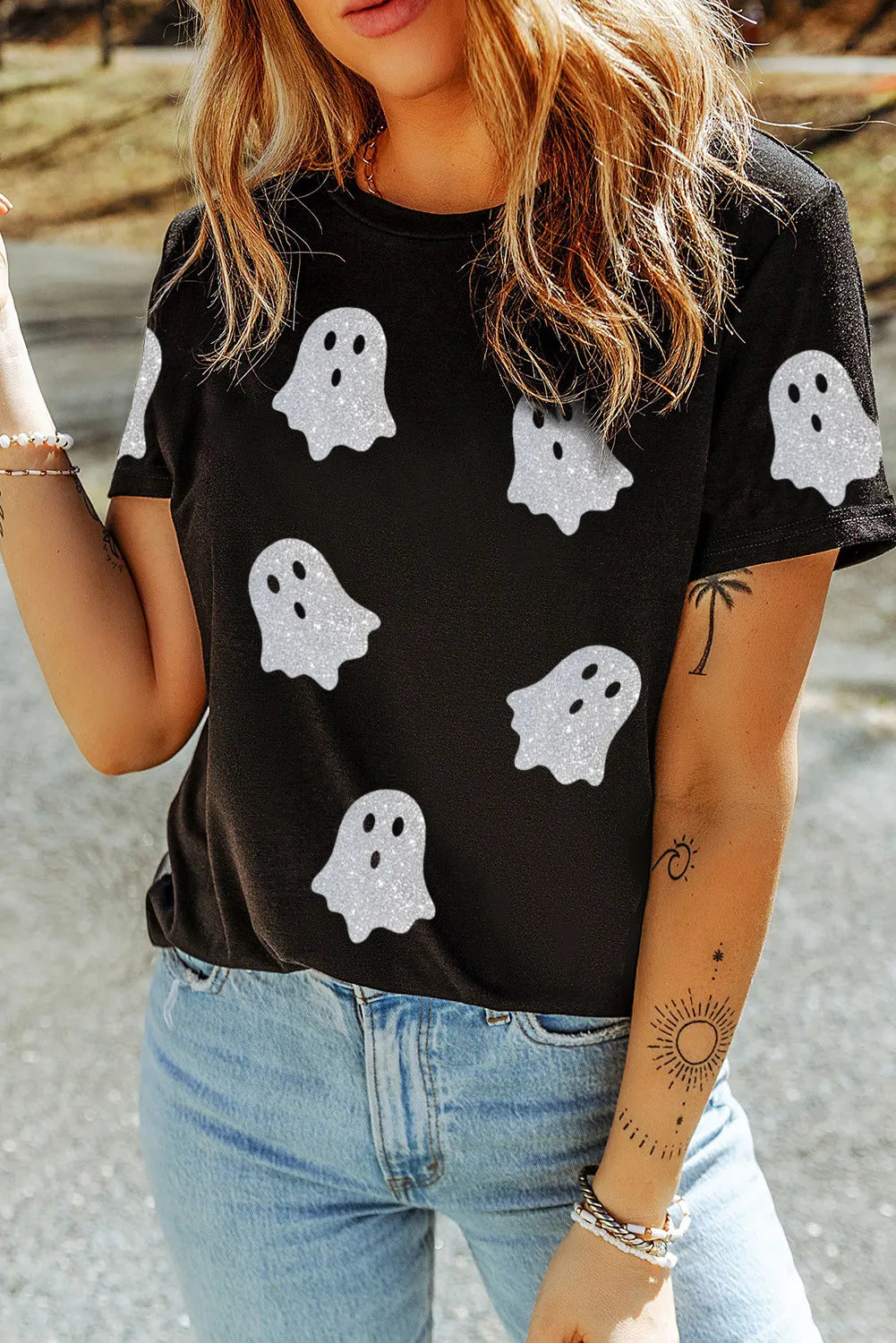 Black crew neck t-shirt with allover glitter ghost motif