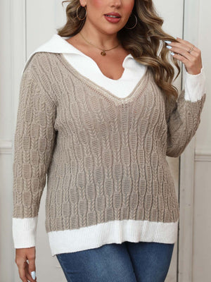 Khaki cable knit sweater with white contrast collar and cuffs.