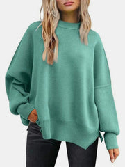 Mint green ribbed knit sweater with slouchy sleeves and mock neck.