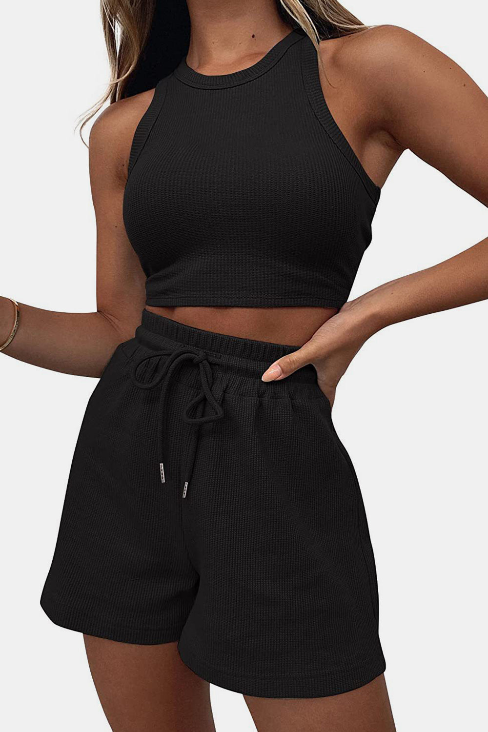 Black ribbed knit crop top and drawstring shorts set with a racerback neckline.