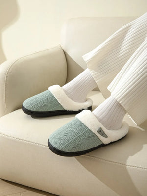 Dusty Blue cable knit shearling house slippers with plush lining.