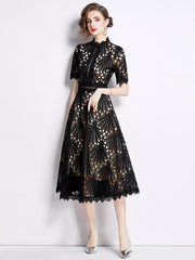 Elegant black lace midi dress with delicate sleeves and a-line cut.