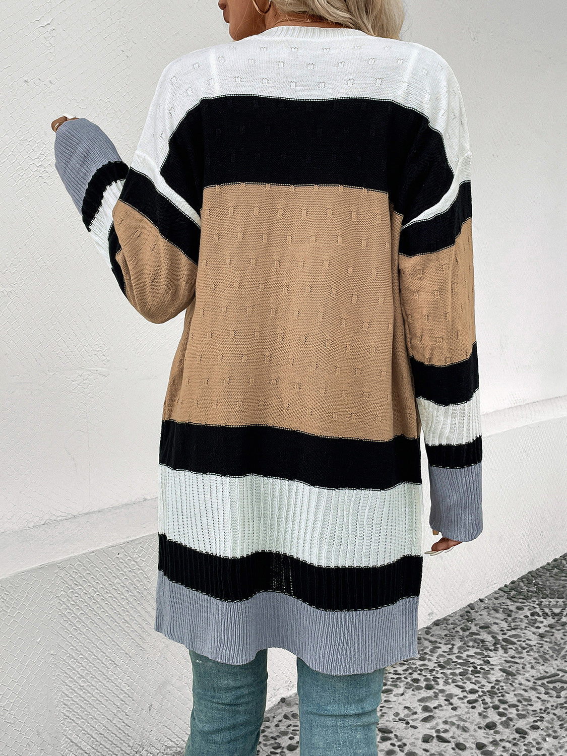 Textured stripe open-front cardigan in camel, black, white, and gray acrylic with a subtle dot pattern.