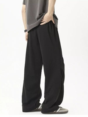 Black plus-size loose fit drawstring jogger pants with a comfortable fit.