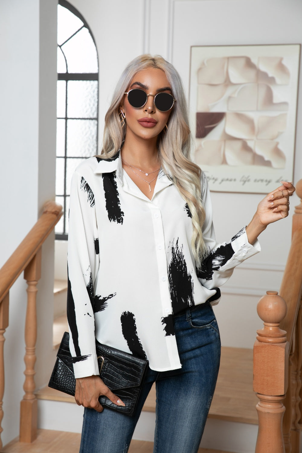 White silk-blend button-down blouse with black brushstroke print and collar.