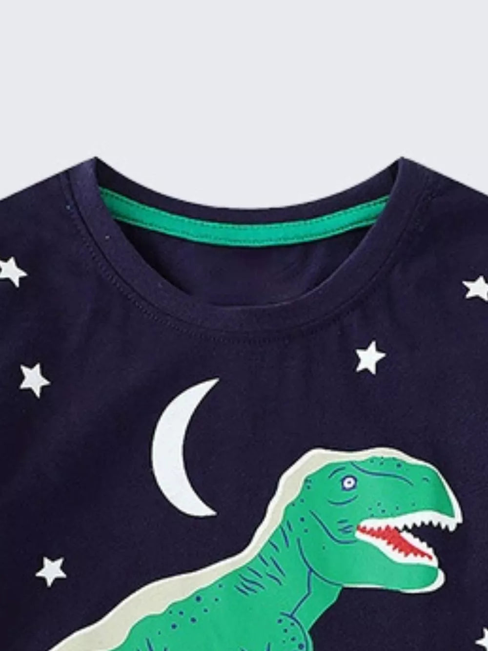 Navy cotton t-shirt with green dinosaur and white stars/moon graphic.
