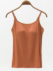 Built-in support cami in Caramel, with adjustable spaghetti straps and a scoop neckline.