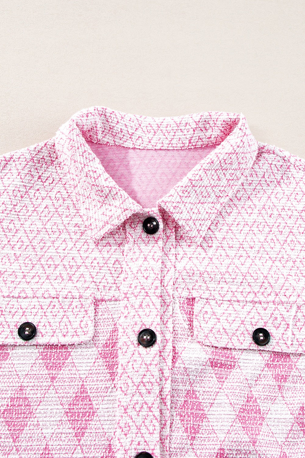 Pink diamond weave shacket with buttoned pockets and collar.