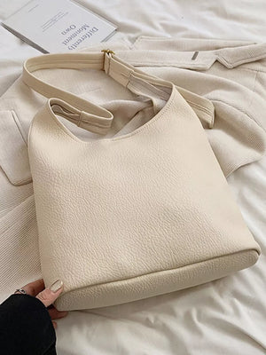 Creamy-white textured pu leather shoulder bag with adjustable strap