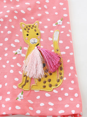 Baby dress with pink polka dots, embroidered leopard applique and tassels.