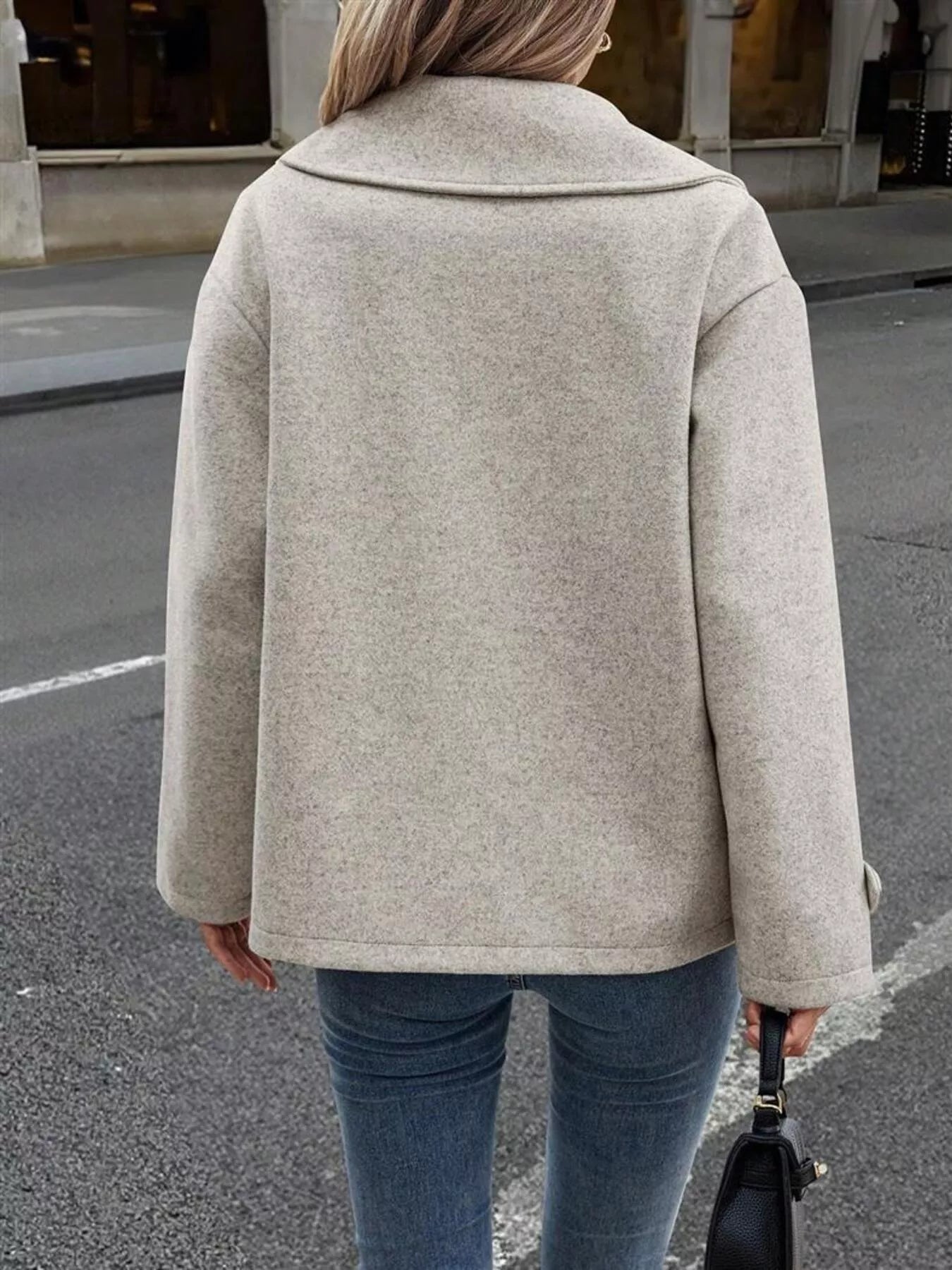 Light gray wool blend double-breasted pea coat with a wide collar.