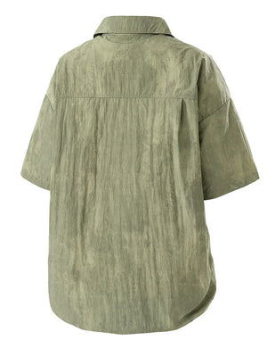Relaxed fit camp collar men's shirt in Military Green, short sleeve, buttoned back view.