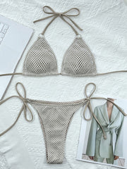 Crochet halter bikini set in ivory with tie sides and triangle cups.
