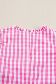 Fuchsia pink gingham blouse with mock neck and ruffle sleeves, back zipper detail.