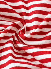 Red and white striped baby pajamas, soft cotton knit fabric.