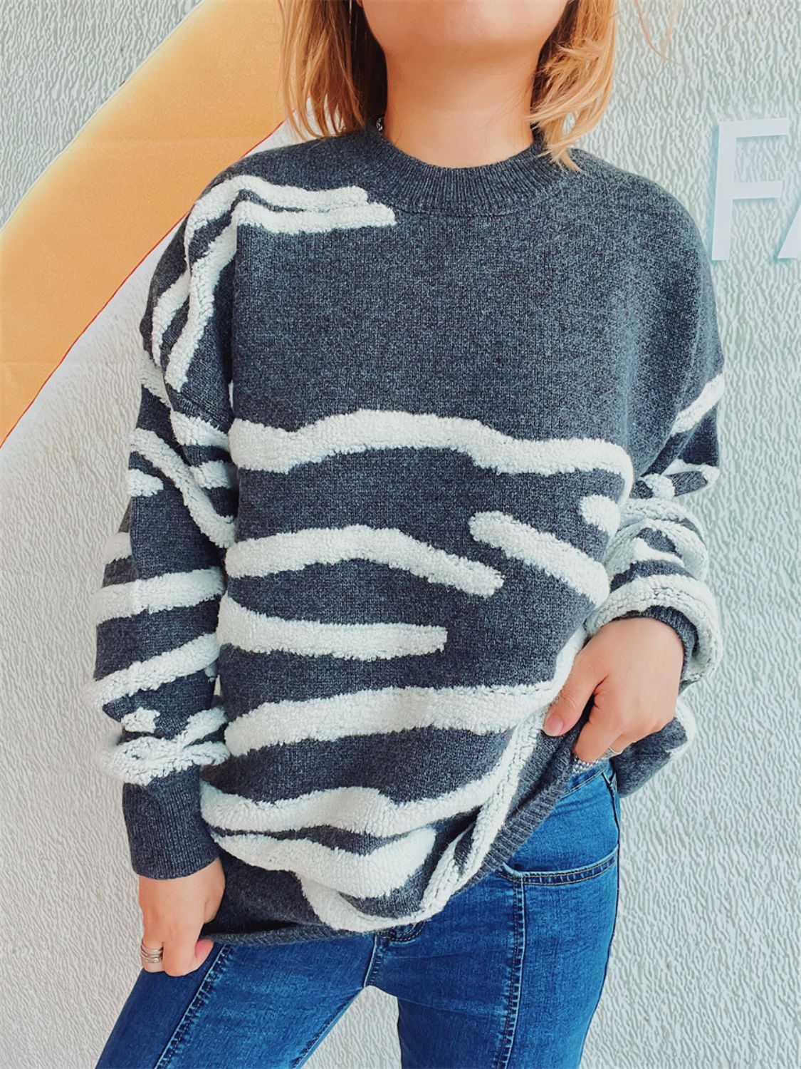 Dark Gray textured stripe knit crewneck sweater with fuzzy white stripes.
