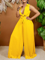 Yellow collared sleeveless romper with tie front and pleated wide legs.