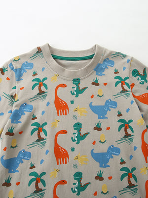 Toddler crew-neck tee in grey cotton with a colorful dinosaur and palm tree print.