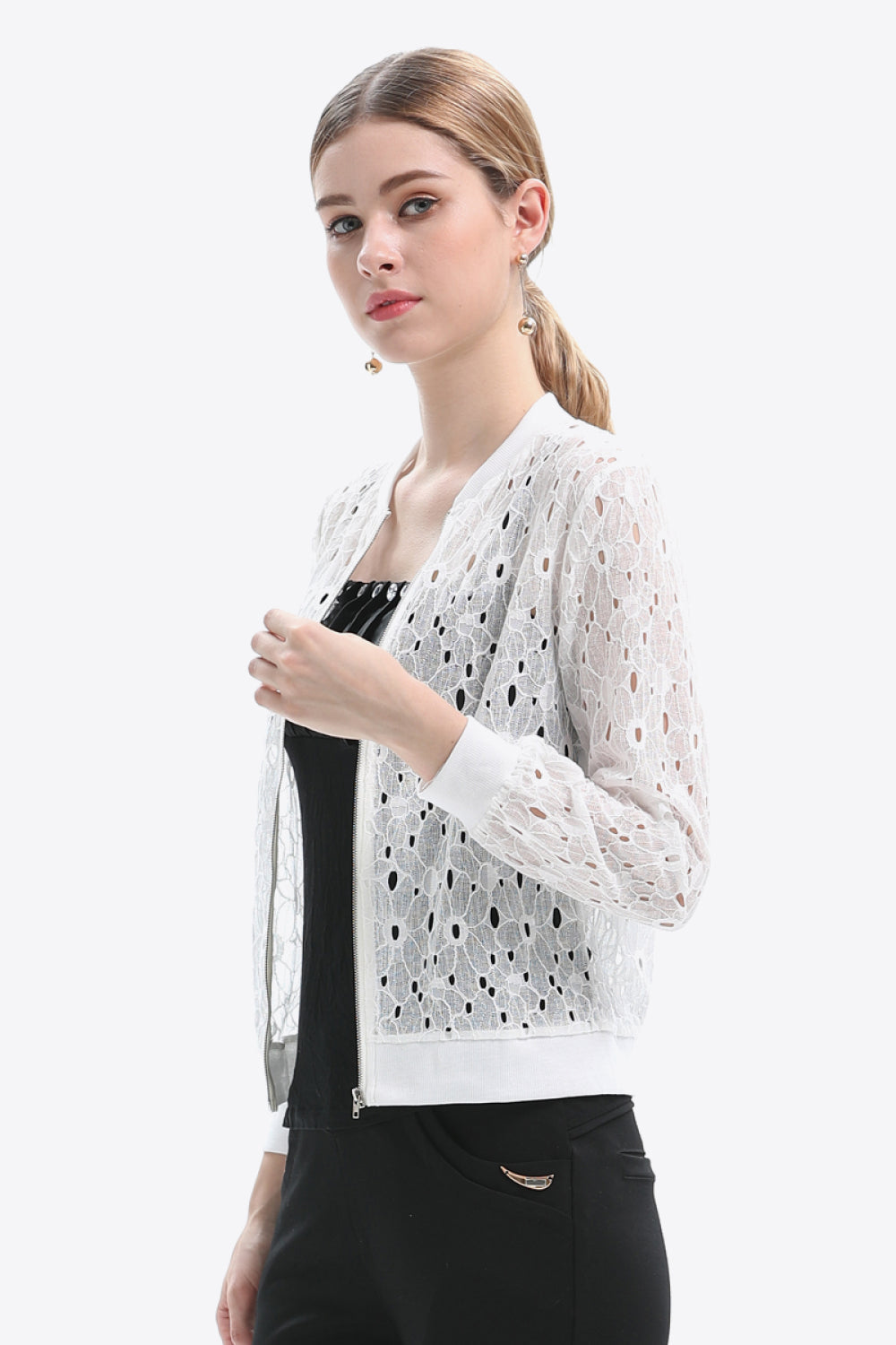 White lace-cut bomber jacket with full zip and ribbed cuffs.
