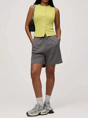 Yellow ribbed button-front fitted tank top with a crew neck and short sleeves.