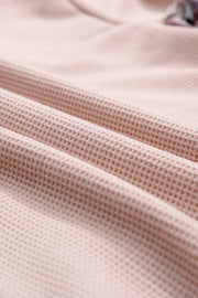 Blush pink waffle knit overshirt with plaid trim detail