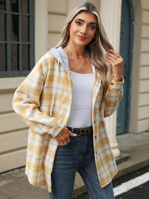 Pastel yellow plaid shacket with contrast grey hood and white drawstring.