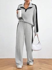 Light gray ribbed polo lounge set with contrast trim and snap button detail.