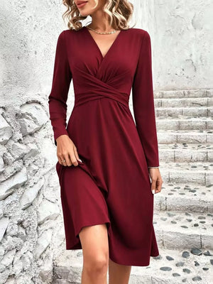 Surplice Long Sleeve Midi Dress in Black, model styling view