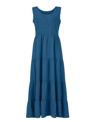 Smocked bodice ruffled maxi dress in Dusty Blue with tiered skirt.