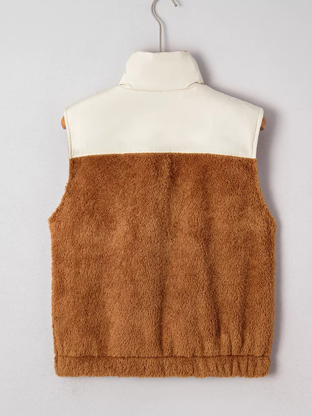 Cozy color block vest coat in beige and brown fuzzy fleece with a stand-up collar.