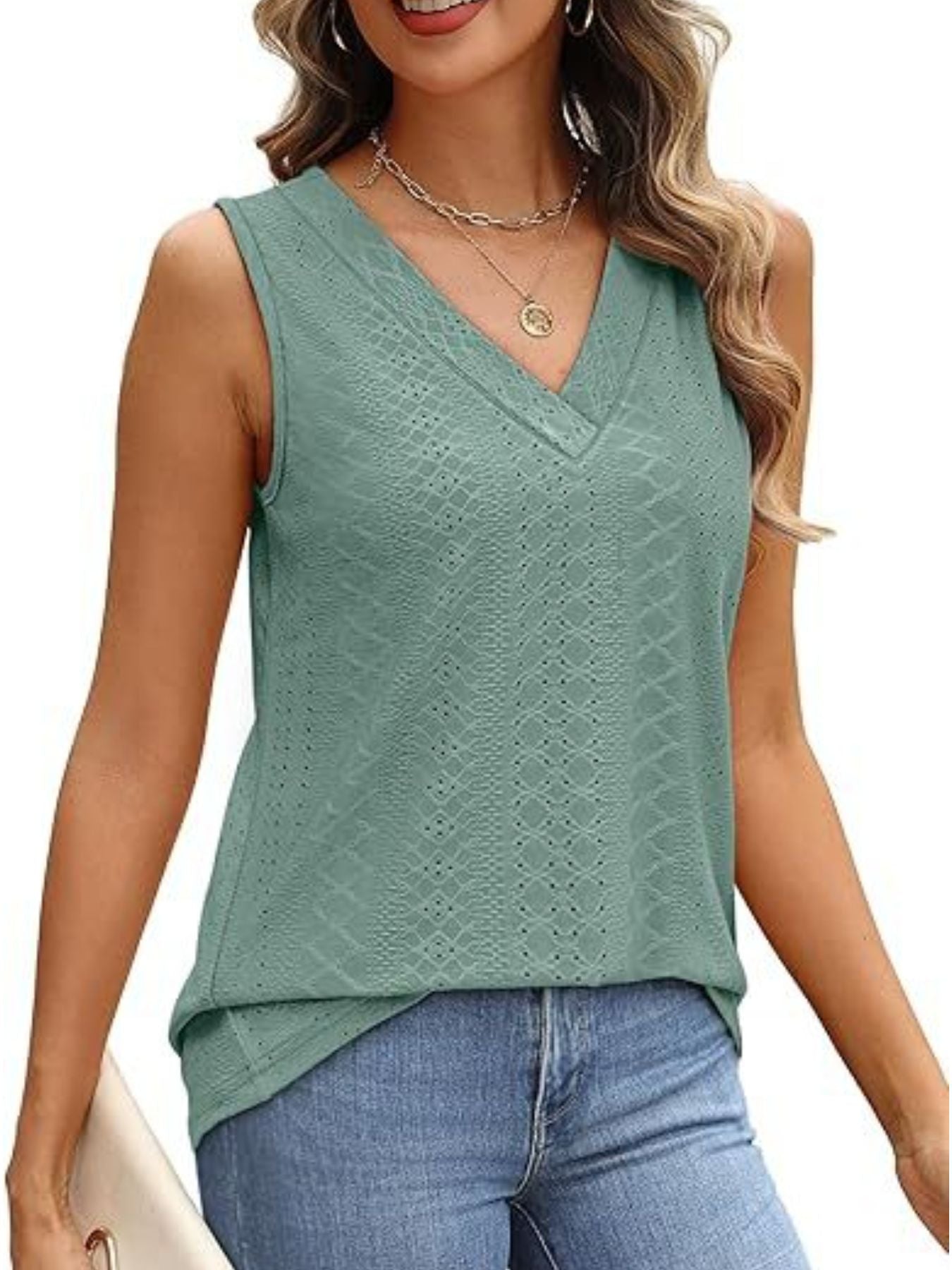 Sleeveless V-neck tank top with eyelet detail and a textured pattern.