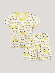 Toddler pajama set with yellow cartoon cars print on white, featuring bright yellow trim.