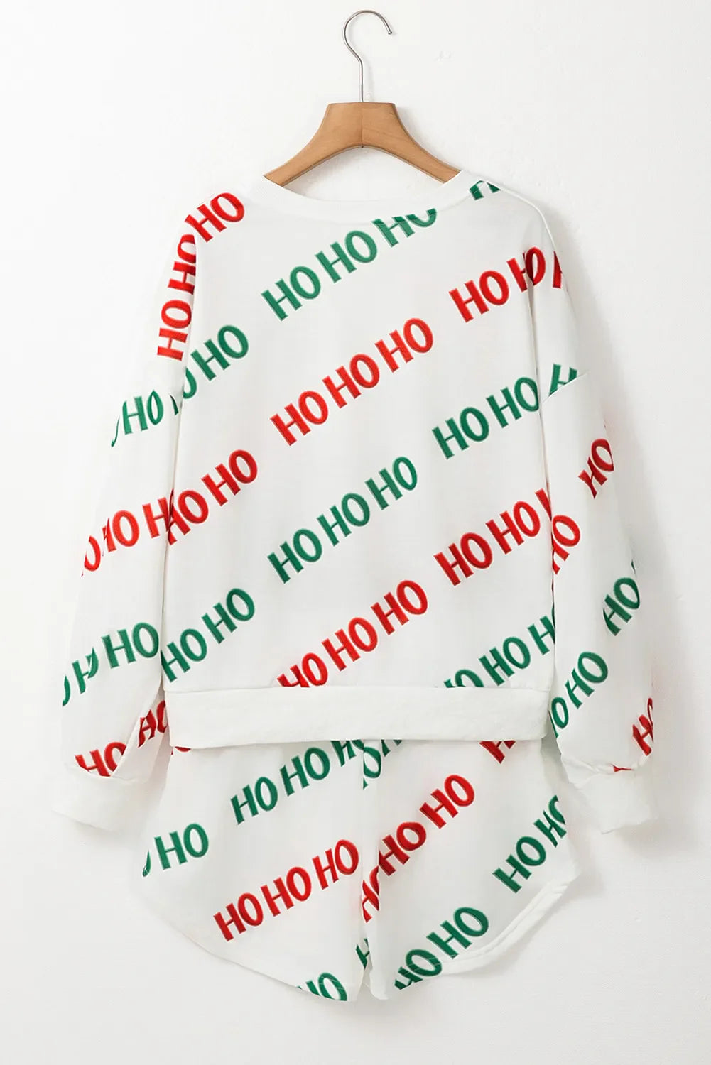 White loungewear set with all-over red and green HO HO HO print.
