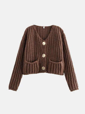 Brown chunky knit cardigan with statement buttons and front pockets.