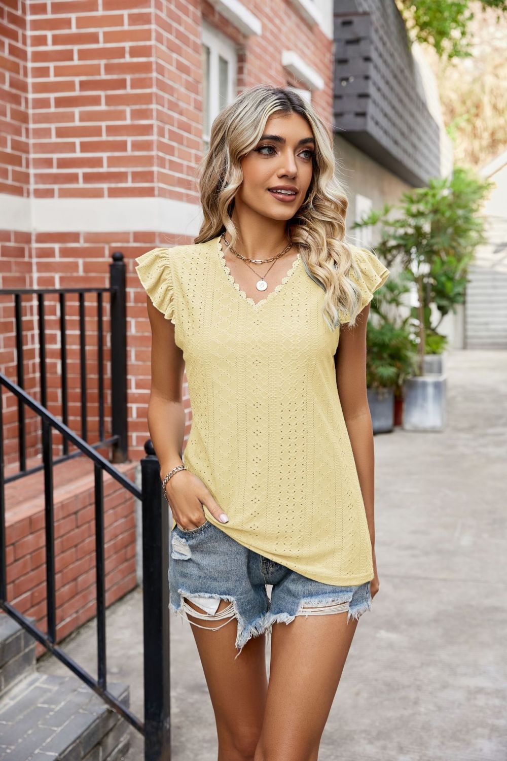 Yellow eyelet lace trim flutter sleeve v-neck blouse