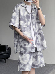 Men's casual camouflage shirt and shorts set in dark gray with a textured pattern.
