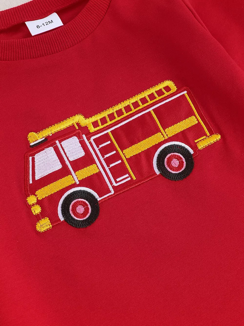 Children's Fire Truck Embroidered Top And Pants Set in Red, close-up detail