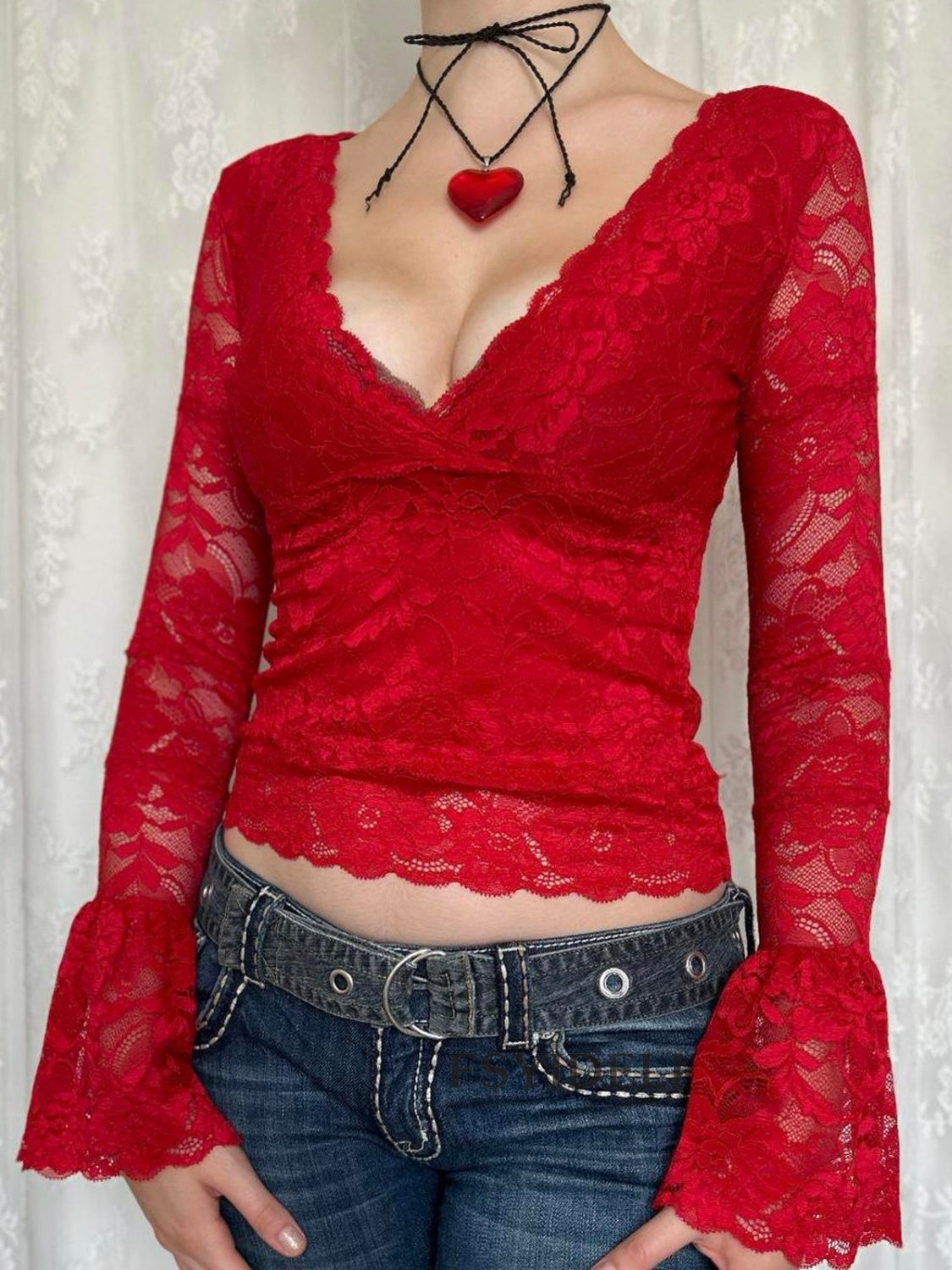 Deep red lace bell sleeve surplice blouse with scalloped trim.