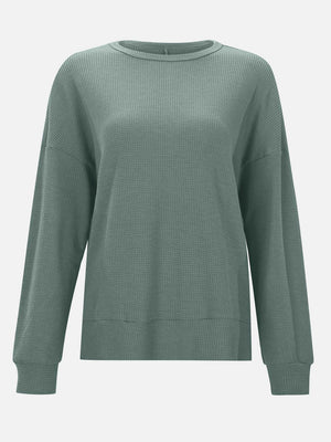 Waffle knit crewneck top in Gum Leaf green with relaxed fit and long sleeves.