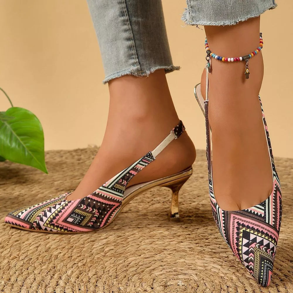 Geometric patterned slingback kitten heels in multicolor with pointed toe and gold heel.