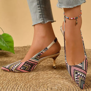 Geometric patterned slingback kitten heels in multicolor with pointed toe and gold heel.