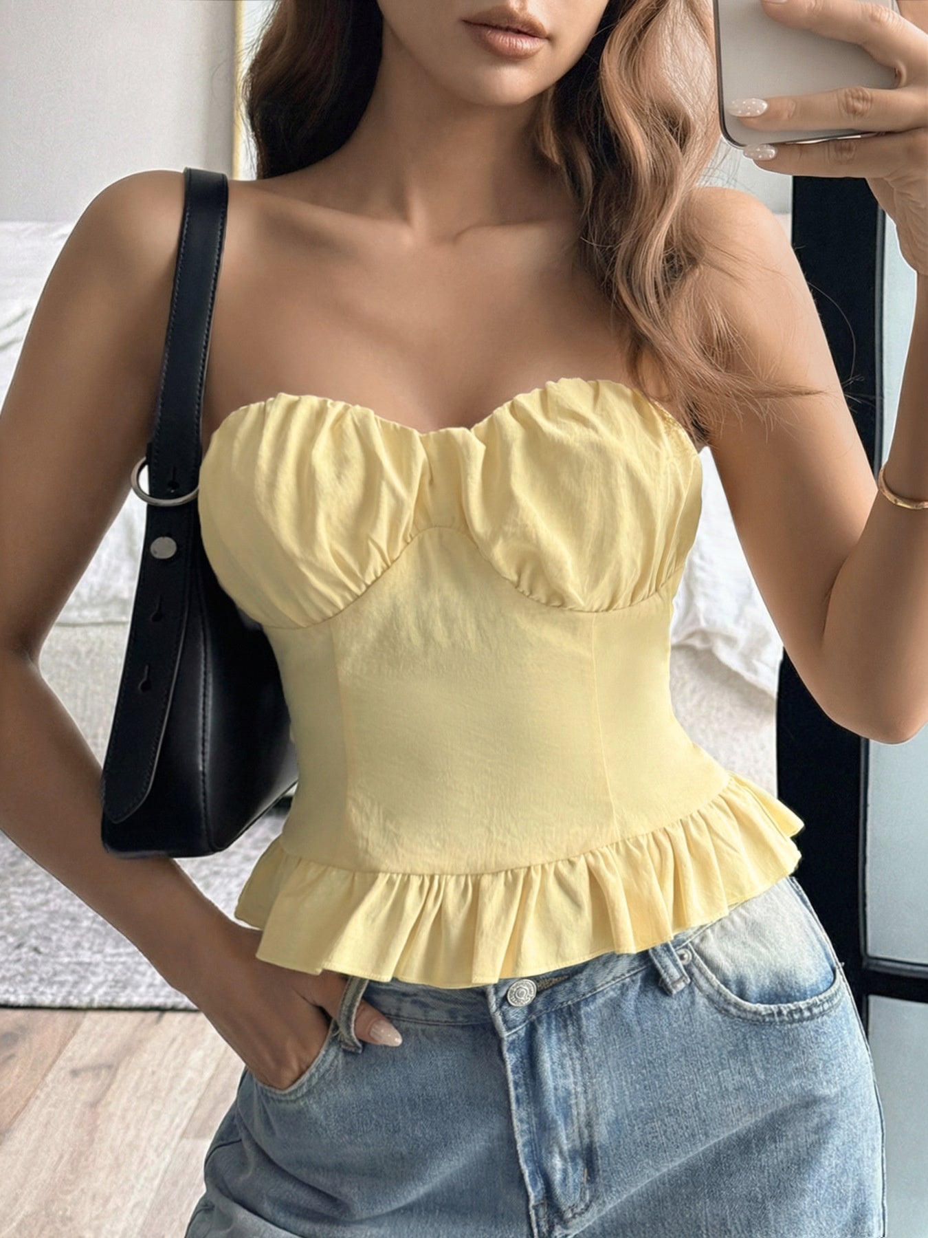Yellow strapless tube top with ruffled hem and sweetheart neckline