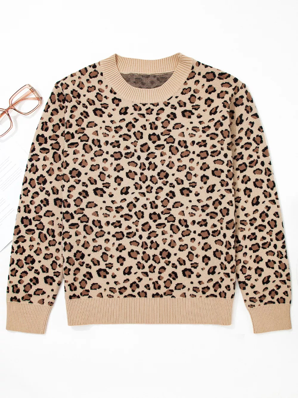 Savanna Spot Long Sleeve Knit Top in beige with animal print, crew neck, and ribbed cuffs and hem.