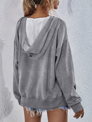 Heather gray boxy hooded sweatshirt with split hem and fleece lining.
