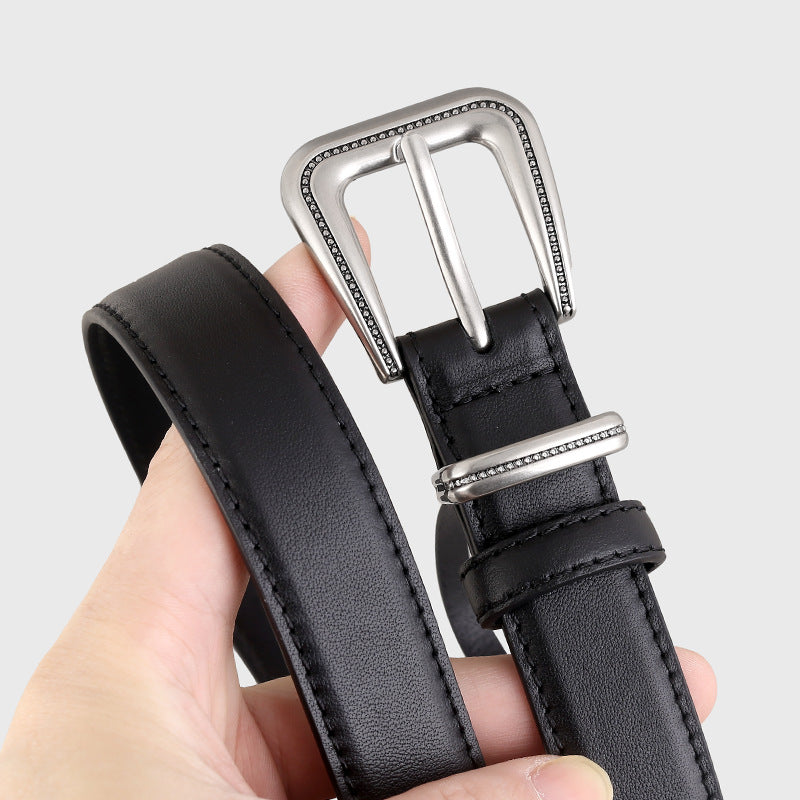 Black cowhide leather belt with ornate silver buckle and keeper