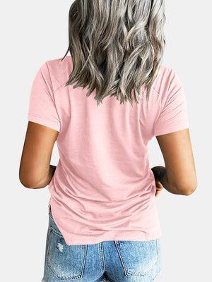 Blush pink raglan pocket t-shirt with short sleeves and a casual fit.