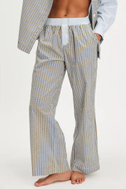Gingham wide-leg lounge trousers in light gray cotton with a drawstring waist and pockets.